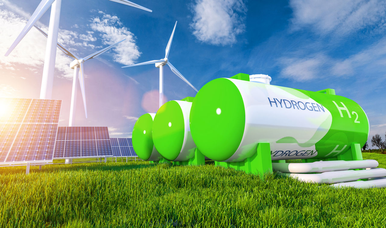 Green Hydrogen renewable energy production pipeline - green hydrogen gas for clean electricity solar and windturbine facility. 